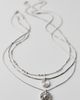 Urban Outfitters Circle Charm Pendant Layering Necklaces Set in Silver, Women's at Urban Outfitters - 1