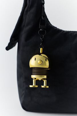 Hoptimist Hoptimist Gold Mini Bumble Keychain in Gold at Urban Outfitters