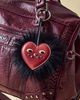 Urban Outfitters Moxie Fluffy Bag Charm in Black Cherry at Urban Outfitters - 1
