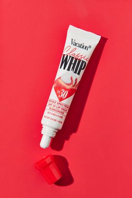 Vacation® Vacation Vacation Classic Whip SPF 30 Lip Balm in Red at Urban Outfitters