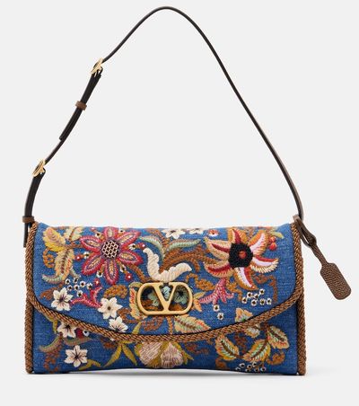Valentino Garavani Valentino Garavani DeVain Small embroidered denim shoulder bag