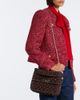Valentino Garavani Valentino Garavani Rockstud Spike Medium suede top-handle bag - 2