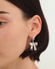 Velvet Luna Velvet Luna Bow Earrings in Silver, Women's at Urban Outfitters - 1