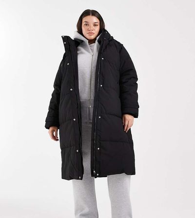 Vero Moda Curve Vero Moda Curve 2 in 1 longline puffer coat with removable sleeves in black
