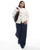 Vero Moda Curve Vero Moda Curve boxy knitted cardigan with pockets in cream-White - 4