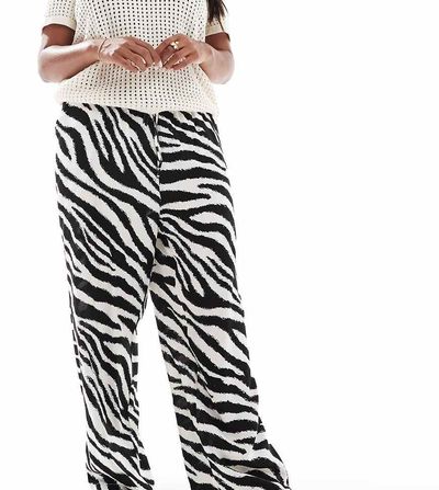 Vero Moda Curve Vero Moda Curve easy tie waist wide leg pants in zebra print-White