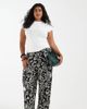 Vero Moda Curve Vero Moda Curve high waist wide leg plisse pants in tropical conversational print-Black - 1