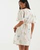 Vero Moda Petite Vero Moda Petite flutter sleeve wrap front mini dress in cream floral print-White - 4