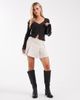 Vero Moda Petite Vero Moda Petite pleated mini skirt in cream-White - 2