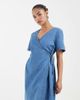 Vero Moda Petite Vero Moda Petite short sleeve wrap front denim mini dress in light blue wash - 1