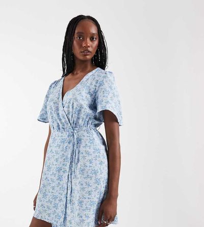 Vero Moda Tall Vero Moda Tall flutter sleeve wrap front mini dress in blue floral print