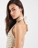 Vero Moda Tall Vero Moda Tall halter neck polka dot mini dress in cream and black-White - 1