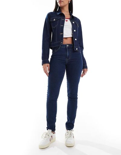 Vero Moda Vero Moda Elly mid rise skinny jeans in medium blue denim