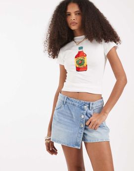 Vero Moda Vero Moda high waist denim mini skort with asymmetric buttons in light blue denim