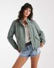 Vero Moda Vero Moda short festival rain coat with hood and drawstring hem in laurel green - 1