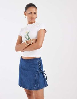 Vero Moda Vero Moda side tie detailing denim mini skirt in medium blue wash