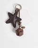 Vero Moda Vero Moda star bag charm in black and brown - 1