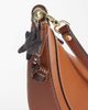 Vero Moda Vero Moda star bag charm in black and brown - 2
