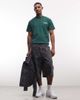 Weekday Weekday baggy cargo shorts in navy camo print - part of a set - 1