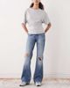 Weekday Weekday distressed bootcut flared jeans in mid blue - 1