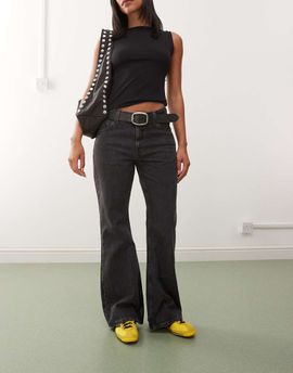 Weekday Weekday Helix low waist wide flare jeans in worn black wash
