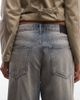 Weekday Weekday low waist baggy wide leg jeans with distressed details in blue with pink tint - 4