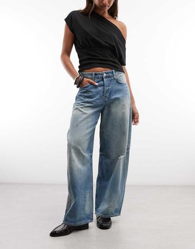 Weekday Low Waist Baggy Wide Leg Jeans With Distressed Details In Faded Blue Wash
