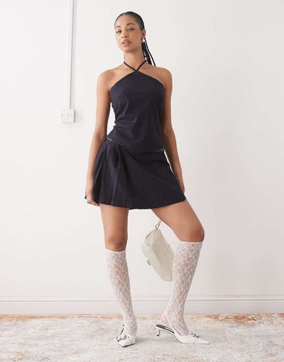 Weekday Weekday mix & match pleated mini skirt in navy pinstripe