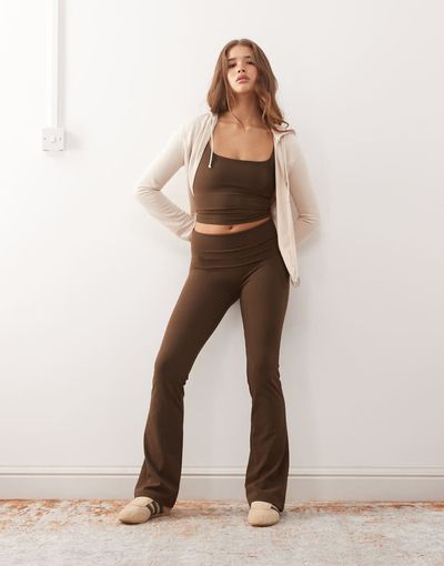 Weekday Weekday mix and match seamless stretch flared yoga leggings in dark brown