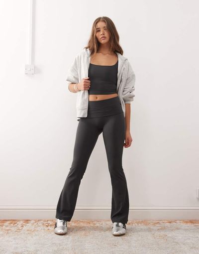 Weekday Weekday mix and match seamless stretch flared yoga leggings in dark gray