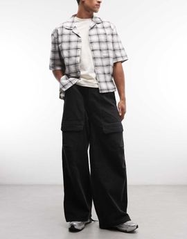 Weekday Weekday oversized parachute pants in washed black