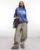 Weekday Weekday oversized t-shirt with spray graphic print in washed blue - 2