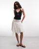 Weekday Weekday pleated asymmetric cut midi skirt in off-white - 1