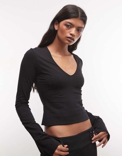 Weekday Weekday v neck long sleeve top in black