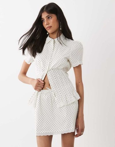 WeWoreWhat WeWoreWhat pull on mini skirt in white polka dots