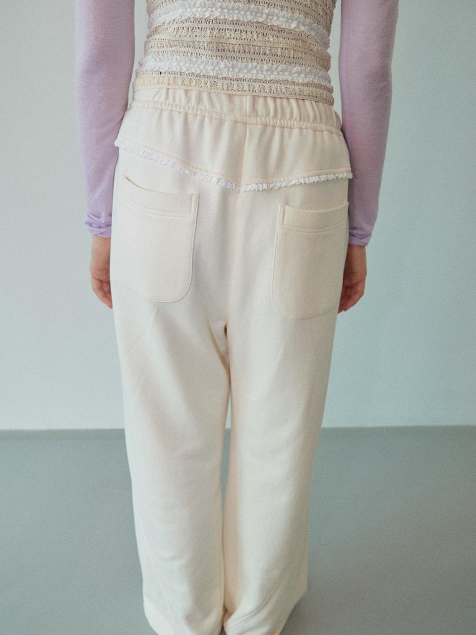 WOVEMENT Backside Lace Edge Sweatpants  WBDFPA002IV