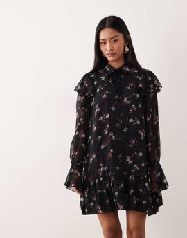 YAS YAS frill trim chiffon mini dress in black based floral print