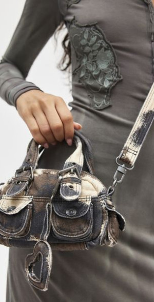 BDG - Printed Mini Denim Duffle Crossbody Bag in Cow Print